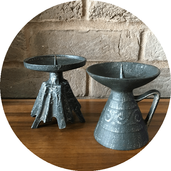 Set of two Brutalist Cast Iron Candle Holders